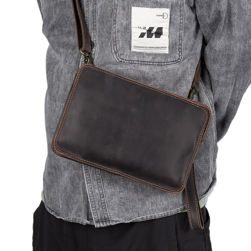 The man is holding a leather s - Interior Design Its review and price